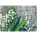 Maiglöckchen auf grauem Hintergrund