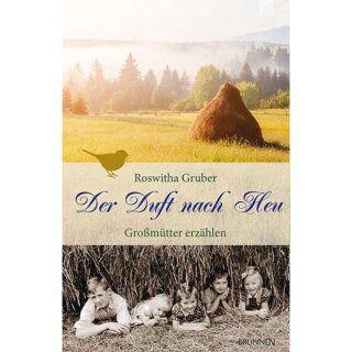 Kinder schauen aus dem Strohhaufen hervor