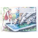 Eine Frau tränkt die Kamele