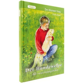 Junge mit einem Hundewelpe