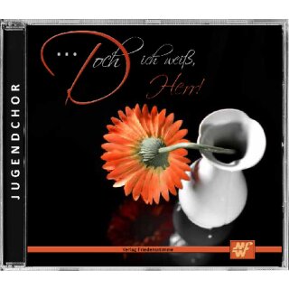 Eine Blume in einer weißen Vade