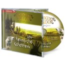 Wolf und Schatten von der Hand und Wald im Hintergrund